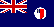 Британский синий кормовой флаг с эмблемой территории в вольной части (англ.: ''The British (Defaced) Blue Ensign with the Badge'')