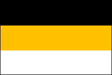 Флаг Российской Империи 1858-1917гг. Первый официально утвержденный государственный флаг России был черно-желто-белый, он был введен указом Александра II в 1858 г.:''Расположение цветов горизонтальное, верхняя полоса чёрная, средняя жёлтая (или золотая), а нижняя белая (или серебряная). Первые полосы соответствуют чёрному государственному орлу в жёлтом или золотом поле и кокарда из сих двух цветов была основана Императором Павлом I , между тем как знамёна и другие украшения из сих цветов употреблялись уже во время Императрицы Анны Иоанновны. Нижняя полоса белая или серебряная соответствует кокарде Петра Великого и Императрицы Екатерины II; Император же Александр II, после взятия Парижа в 1814 году, соединил правильную гербовую кокарду с древнею Петра Великого, которая соответствует белому или серебряному всаднику (Св. Георгию) в Московском гербе''.